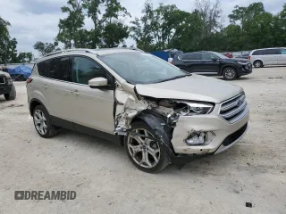 2017 Ford Escape Titanium with VIN 1FMCU0J95HUB96659, listed as a Copart auction lot 54053775 with 69,744 mi miles and Salvage Title. Bid and sale history available at DreamBid. Image 4.