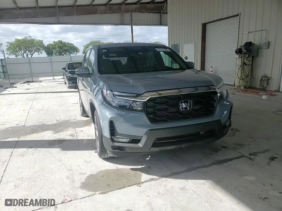 2023 Honda Passport EX-L with VIN 5FNYF8H52PB033710, listed as a Copart auction lot 87916565 with 8,378 mi miles and Salvage Title. Bid and sale history available at carsss.com. Image 14.