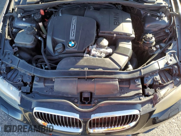 2012 BMW 3 Series 335i with VIN WBAKG7C5XCE803150, listed as a Copart auction lot 76390994 with 113,731 mi miles and Salvage Title. Bid and sale history available at carsss.com. Image 11.