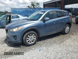 2014 Mazda CX-5 Touring with VIN JM3KE4CYXE0409558, listed as a Copart auction lot 51762995 with 91,082 mi miles and Salvage Title. Bid and sale history available at carsss.com. Image 1.