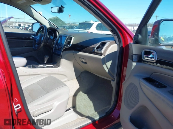 2012 Jeep Grand Cherokee Laredo with VIN 1C4RJFAG7CC297757, listed as a IAAI auction lot 41901645 with 270,731 mi miles. Bid and sale history available at carsss.com. Image 5.