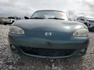 2001 Mazda MX-5 Miata z VIN JM1NB353610200693, wystawiony jako Copart lot #55385725 z przebiegiem 98 777 mil mil oraz Szkoda całkowita • Salvage title. Historia ofert i sprzedaży dostępna na DreamBid. Obrazek 5.