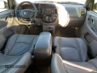 2001 Mazda Tribute LX with VIN 4F2CU08111KM20113, listed as a Copart auction lot 87681195 with 144,400 mi miles and Salvage Title. Bid and sale history available at DreamBid. Image 8.