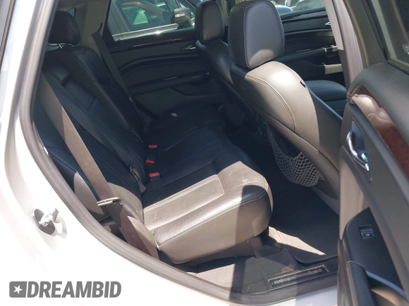 2015 Cadillac SRX Luxury Collection z VIN 3GYFNBE35FS627640, wystawiony jako IAAI lot #42262843 z przebiegiem 211 669 mil mil oraz . Historia ofert i sprzedaży dostępna na DreamBid. Obrazek 8.