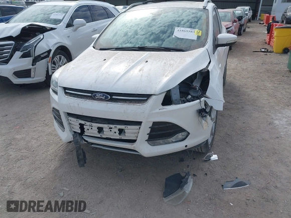 2015 Ford Escape Titanium with VIN 1FMCU9J90FUA67262, listed as a IAAI auction lot 41869583 with 161,281 mi miles. Bid and sale history available at carsss.com. Image 6.