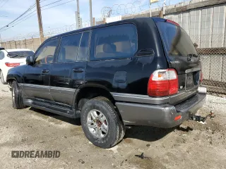 2001 Lexus LX 470 with VIN JTJHT00W613504449, listed as a Copart auction lot 45995455 with 229,056 mi miles and Salvage Title. Bid and sale history available at DreamBid. Image 2.