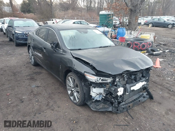 2019 Mazda 6 Grand Touring Reserve with VIN JM1GL1WY6K1505935, listed as a IAAI auction lot 41626078 with 19,000 mi miles and . Bid and sale history available at DreamBid. Image 1.