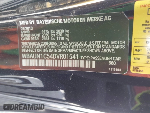 2013 BMW 1 Series 128i with VIN WBAUN1C54DVR01541, listed as a IAAI auction lot 42802640 with 119,881 mi miles and . Bid and sale history available at DreamBid. Image 9.