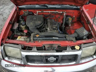 2000 Nissan Frontier XE z VIN 1N6DD21S8YC338304, wystawiony jako Copart lot #83990454 z przebiegiem 184 467 mil mil oraz Szkoda całkowita • Salvage title. Historia ofert i sprzedaży dostępna na DreamBid. Obrazek 13.