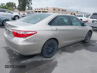 2015 Toyota Camry LE with VIN 4T1BD1FK4FU165560, listed as a IAAI auction lot 42135474 with 422,041 mi miles and . Bid and sale history available at DreamBid. Image 4.