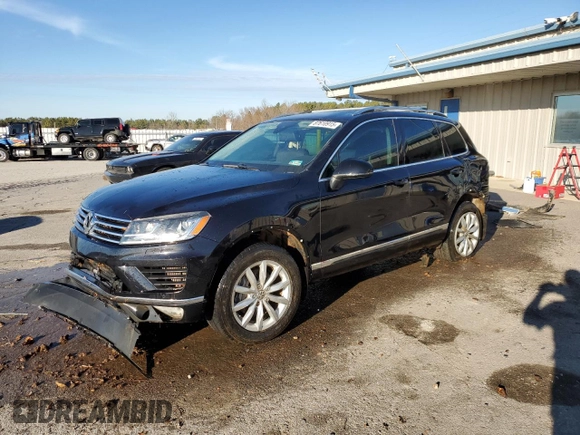 2016 Volkswagen Touareg Sport z VIN WVGEP9BP3GD004865, wystawiony jako Copart lot #87610915 z przebiegiem Nie podano mil oraz Szkoda całkowita • Salvage title. Historia ofert i sprzedaży dostępna na DreamBid. Obrazek 1.