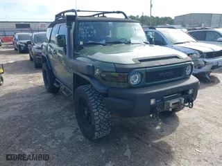 2014 Toyota FJ Cruiser with VIN JTEBU4BFXEK192640, listed as a IAAI auction lot 41349553 with 49,308 mi miles. Bid and sale history available at carsss.com. Image 1.