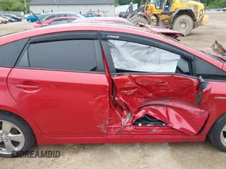 2015 Toyota Prius Four z VIN JTDKN3DUXF1887604, wystawiony jako IAAI lot #42341221 z przebiegiem 123 196 mil mil oraz . Historia ofert i sprzedaży dostępna na DreamBid. Obrazek 13.