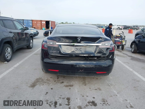 2017 Tesla Model S 100D with VIN 5YJSA1E28HF188981, listed as a IAAI auction lot 42010115 with 76,327 mi miles and . Bid and sale history available at DreamBid. Image 16.