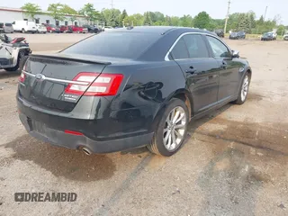 2014 Ford Taurus Limited with VIN 1FAHP2F88EG171235, listed as a IAAI auction lot 42402720 with 79,951 mi miles and . Bid and sale history available at DreamBid. Image 4.
