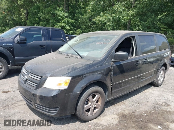 2010 Dodge Grand Caravan SE with VIN 2D4RN4DE2AR339889, listed as a IAAI auction lot 40034624 with 104,896 mi miles and . Bid and sale history available at DreamBid. Image 2.