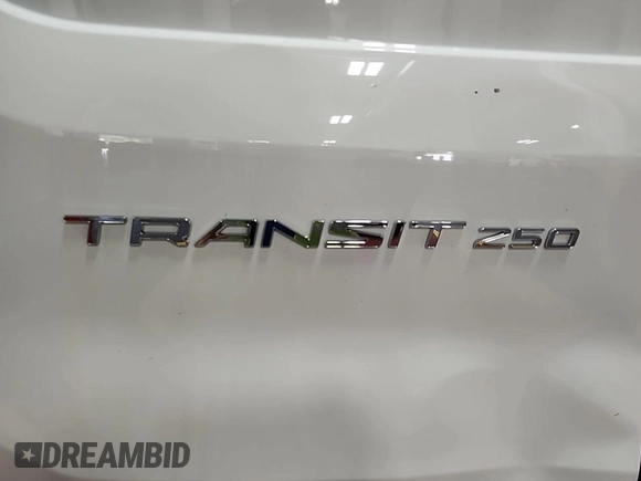 2020 Ford Transit Cargo z VIN 1FTBR2YG1LKA51866, wystawiony jako IAAI lot #42842416 z przebiegiem 141 231 mil mil oraz . Historia ofert i sprzedaży dostępna na DreamBid. Obrazek 34.