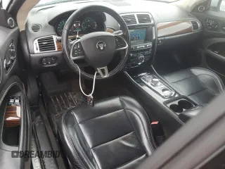 2014 Jaguar XK with VIN SAJWA4GB7ELB54429, listed as a Copart auction lot 72463344 with 72,711 mi miles and Salvage Title. Bid and sale history available at carsss.com. Image 8.