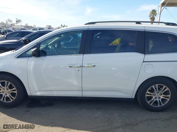 2011 Honda Odyssey EX-L with VIN 5FNRL5H67BB007777, listed as a IAAI auction lot 41402903 with 210,921 mi miles. Bid and sale history available at carsss.com. Image 15.