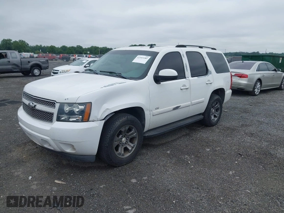 2007 Chevrolet Tahoe LTZ with VIN 1GNFK13007J149042, listed as a IAAI auction lot 42593189 with 216,791 mi miles and . Bid and sale history available at DreamBid. Image 2.