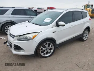 2015 Ford Escape Titanium with VIN 1FMCU0J98FUC07537, listed as a IAAI auction lot 41440462 with 233,924 mi miles. Bid and sale history available at carsss.com. Image 2.