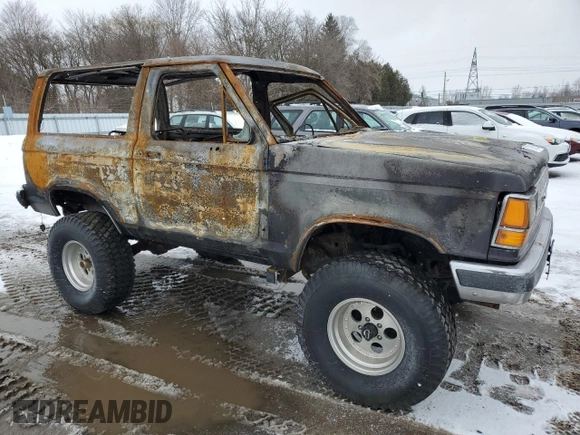 1987 Ford Bronco с VIN 1FMCU14T3HUC77415, выставлен на аукционе Copart как лот 47737825 с пробегом Не указан миль и На запчасти • Non repairable. История ставок и продаж доступна на DreamBid. Изображение 4.
