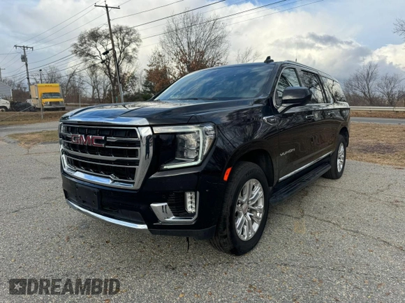 2021 GMC Yukon XL SLT with VIN 1GKS2GKDXMR238116, listed as a Copart auction lot 83266714 with 106,975 mi miles and Clean Title. Bid and sale history available at carsss.com. Image 2.