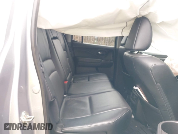 2017 Honda Ridgeline RTL with VIN 5FPYK3F52HB019266, listed as a IAAI auction lot 42638081 with 117,004 mi miles and . Bid and sale history available at DreamBid. Image 8.