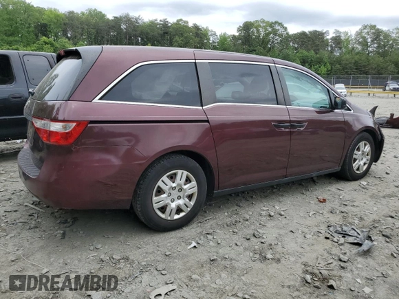2011 Honda Odyssey LX z VIN 5FNRL5H29BB057920, wystawiony jako Copart lot #56433905 z przebiegiem 143 551 mil mil oraz Szkoda całkowita • Salvage title. Historia ofert i sprzedaży dostępna na DreamBid. Obrazek 3.
