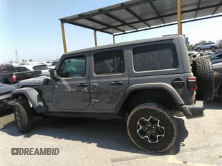 2022 Jeep Wrangler Unlimited Rubicon with VIN 1C4JJXR60NW182756, listed as a IAAI auction lot 36927414 with Not provided miles and . Bid and sale history available at DreamBid. Image 14.