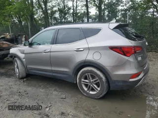 2017 Hyundai Santa Fe 2.4L z VIN 5NMZU3LB8HH032409, wystawiony jako Copart lot #57939915 z przebiegiem 105 494 mil mil oraz Szkoda całkowita • Salvage title. Historia ofert i sprzedaży dostępna na DreamBid. Obrazek 2.