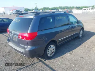 2008 Toyota Sienna XLE with VIN 5TDBK22C58S017861, listed as a IAAI auction lot 42604679 with 144,934 mi miles and . Bid and sale history available at DreamBid. Image 4.