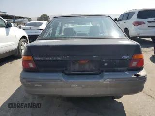 1992 Ford Escort z VIN 1FAPP11JXNW156984, wystawiony jako Copart lot #63462264 z przebiegiem 37 774 mil mil oraz Szkoda całkowita • Salvage title. Historia ofert i sprzedaży dostępna na DreamBid. Obrazek 6.