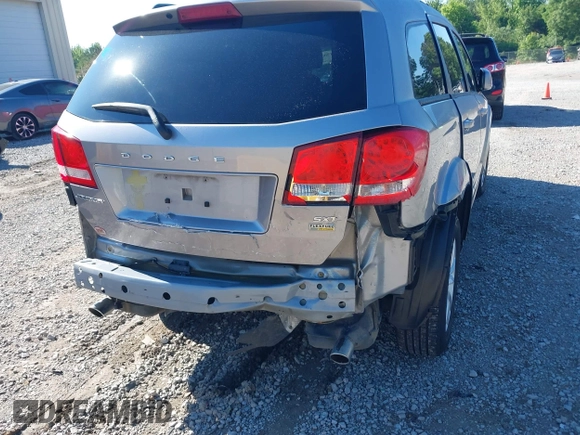 2017 Dodge Journey SXT z VIN 3C4PDCBG4HT563310, wystawiony jako IAAI lot #42190636 z przebiegiem 171 054 mil mil oraz . Historia ofert i sprzedaży dostępna na DreamBid. Obrazek 6.