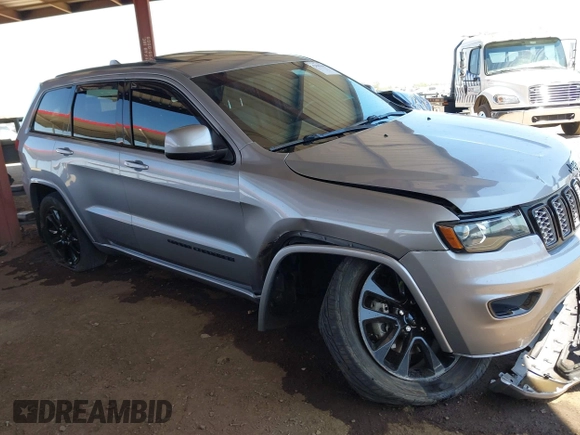 2019 Jeep Grand Cherokee Upland with VIN 1C4RJFAG9KC565951, listed as a IAAI auction lot 42009440 with 93,833 mi miles. Bid and sale history available at carsss.com. Image 1.