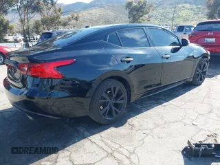 2018 Nissan Maxima S with VIN 1N4AA6AP9JC388366, listed as a IAAI auction lot 41842042 with 103,597 mi miles and . Bid and sale history available at DreamBid. Image 4.