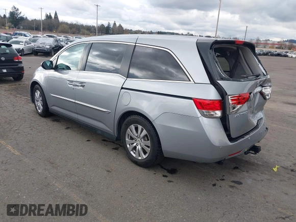 2016 Honda Odyssey EX-L with VIN 5FNRL5H64GB048004, listed as a IAAI auction lot 41676712 with 129,343 mi miles. Bid and sale history available at carsss.com. Image 3.