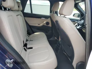 2019 BMW X1 sDrive28i z VIN WBXHU7C56K5N33695, wystawiony jako Copart lot #55492205 z przebiegiem 18 824 mil mil oraz Szkoda całkowita • Salvage title. Historia ofert i sprzedaży dostępna na DreamBid. Obrazek 11.