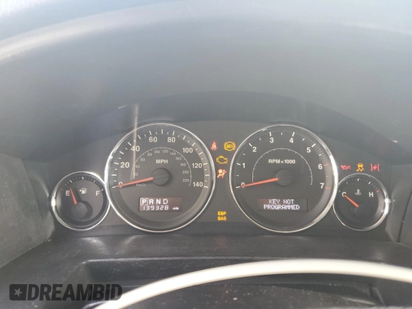 2010 Jeep Commander Sport z VIN 1J4RH4GK1AC125470, wystawiony jako Copart lot #85075094 z przebiegiem 139 328 mil mil oraz Szkoda całkowita • Salvage title. Historia ofert i sprzedaży dostępna na DreamBid. Obrazek 9.