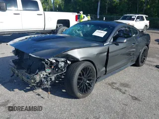 2017 Ford Mustang EcoBoost z VIN 1FA6P8TH5H5287023, wystawiony jako IAAI lot #42600833 z przebiegiem 103 685 mil mil oraz . Historia ofert i sprzedaży dostępna na DreamBid. Obrazek 2.