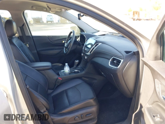 2018 Chevrolet Equinox Premier with VIN 3GNAXVEV4JS598239, listed as a IAAI auction lot 42112886 with 142,093 mi miles and . Bid and sale history available at DreamBid. Image 5.
