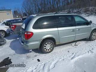 2003 Chrysler Town & Country LX with VIN 2C4GP44L43R224016, listed as a IAAI auction lot 41370108 with 122,418 mi miles and . Bid and sale history available at DreamBid. Image 4.