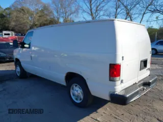 2011 Ford Econoline Cargo Commercial with VIN 1FTNE1EW2BDA61677, listed as a IAAI auction lot 41854181 with 195,582 mi miles and . Bid and sale history available at carsss.com. Image 3.