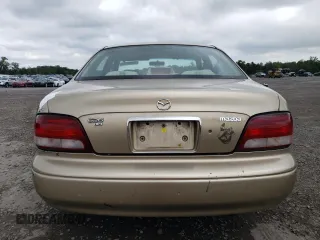 1998 Mazda 626 DX with VIN 1YVGF22CXW5733338, listed as a Copart auction lot 71796184 with 196,218 mi miles and Salvage Title. Bid and sale history available at carsss.com. Image 6.
