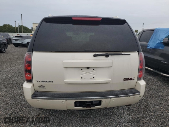 2014 GMC Yukon Denali with VIN 1GKS2EEF0ER102970, listed as a Copart auction lot 73739364 with 125,312 mi miles and Non Repairable. Bid and sale history available at carsss.com. Image 6.