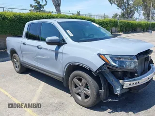 2022 Honda Ridgeline RTL-E z VIN 5FPYK3F78NB028776, wystawiony jako IAAI lot #42077805 z przebiegiem 22 971 mil mil oraz . Historia ofert i sprzedaży dostępna na DreamBid. Obrazek 1.