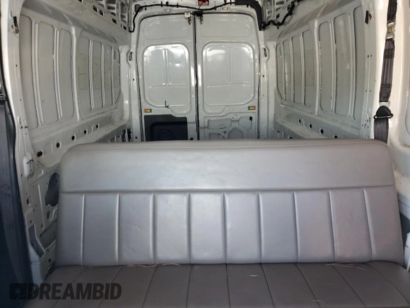 2016 Ford Transit Cargo with VIN 1FTBW3XG5GKB09483, listed as a Copart auction lot 56157045 with 216,399 mi miles and Salvage title. Bid and sale history available at DreamBid. Image 10.
