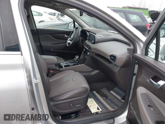 2019 Hyundai Santa Fe Ultimate with VIN 5NMS5CAD1KH000394, listed as a IAAI auction lot 41455421 with 42,886 mi miles and . Bid and sale history available at DreamBid. Image 5.