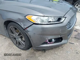 2013 Ford Fusion Titanium with VIN 3FA6P0K96DR131317, listed as a IAAI auction lot 42552736 with 154,762 mi miles and . Bid and sale history available at DreamBid. Image 6.