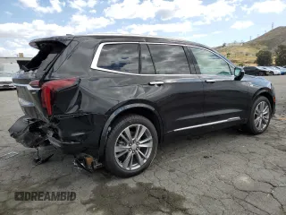 2023 Cadillac XT6 FWD Premium Luxury with VIN 1GYKPCRS5PZ220616, listed as a Copart auction lot 56913725 with 25,860 mi miles and Salvage title. Bid and sale history available at DreamBid. Image 3.